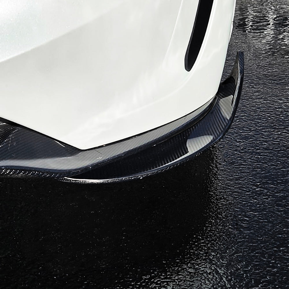 Close up of Carbon Fiber Front Lip installed on white Tesla Model 3 Highland Performance