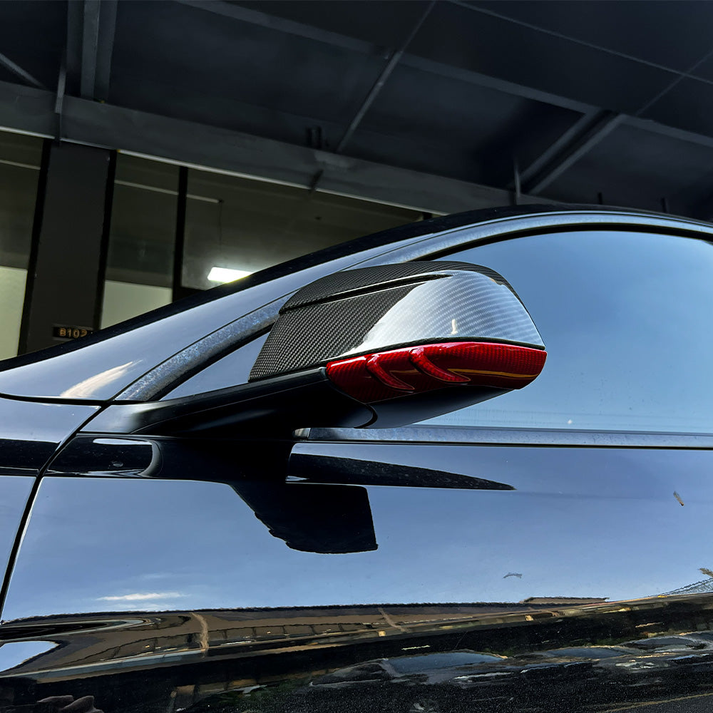 Side view of Tesla Model Y Carbon Fiber Mirror Covers (Upper & Lower)