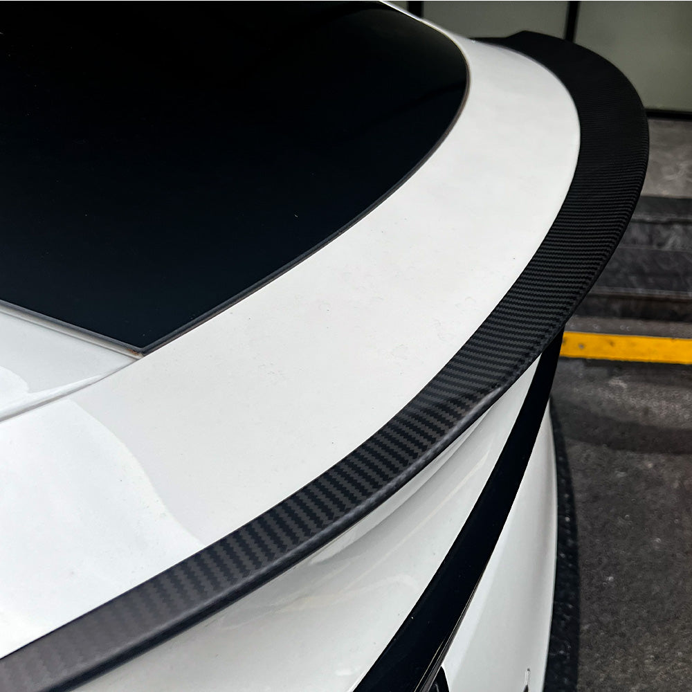 close-up detail of Model Y Juniper Carbon Fiber Rear Spoiler Wing–Tesla YL OEM Style