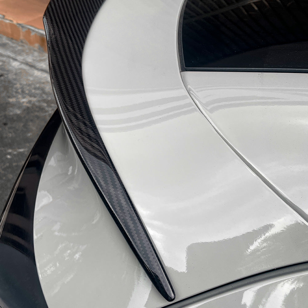 close-up detail of Model Y Juniper Carbon Fiber Rear Spoiler Wing–Tesla YL OEM Style