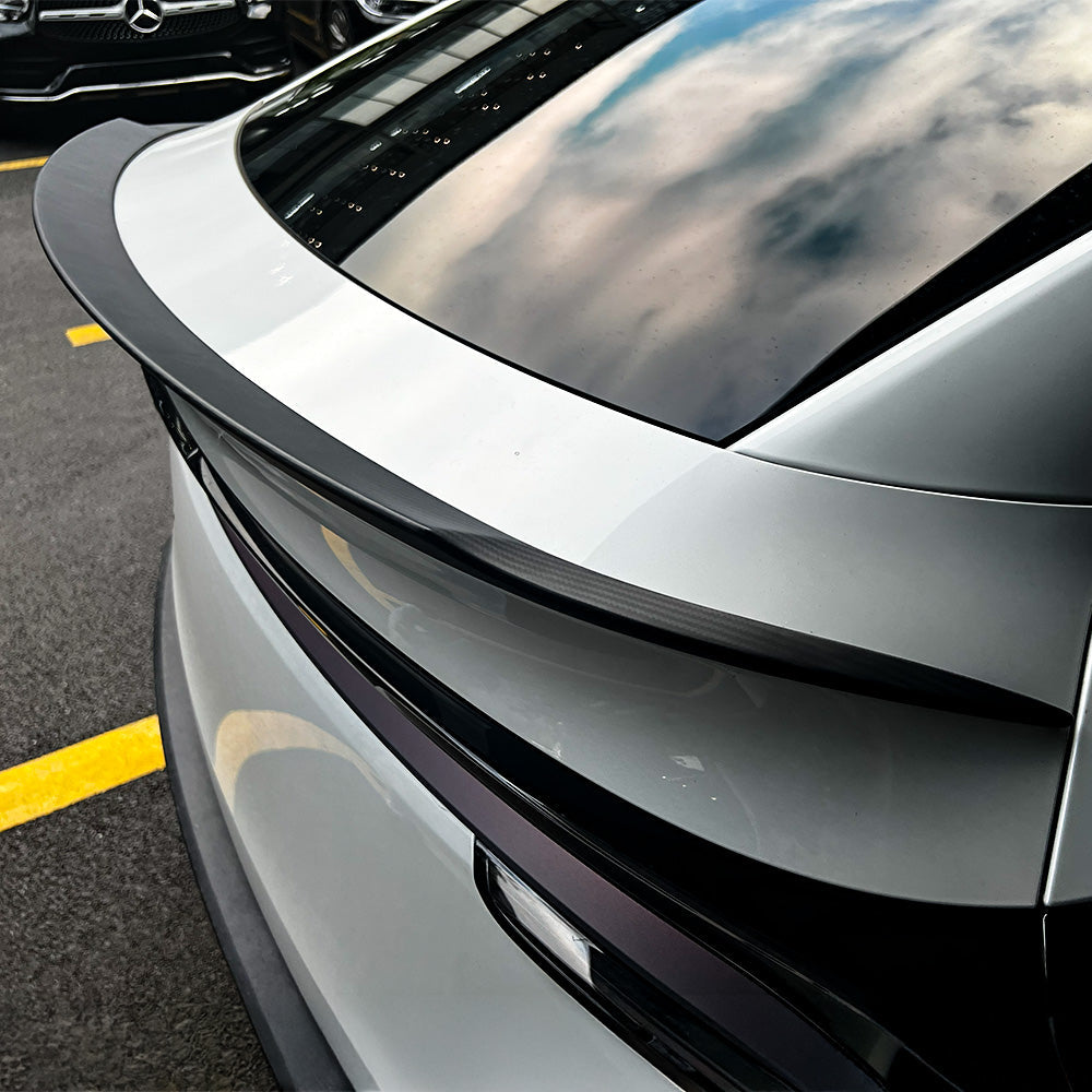 close-up detail of Model Y Juniper Carbon Fiber Rear Spoiler Wing–Tesla YL OEM Style