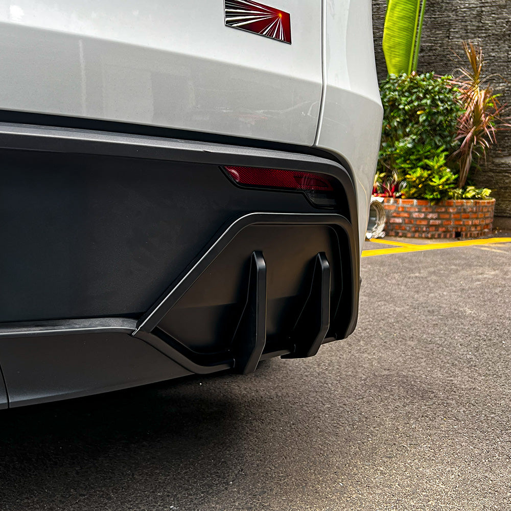 Close-up of the right of Tesla Model Y Juniper ABS Split Rear Diffuser